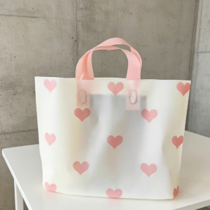 Bolsa con manija diseño corazones
