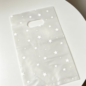 Bolsa riñón estampada estrellitas